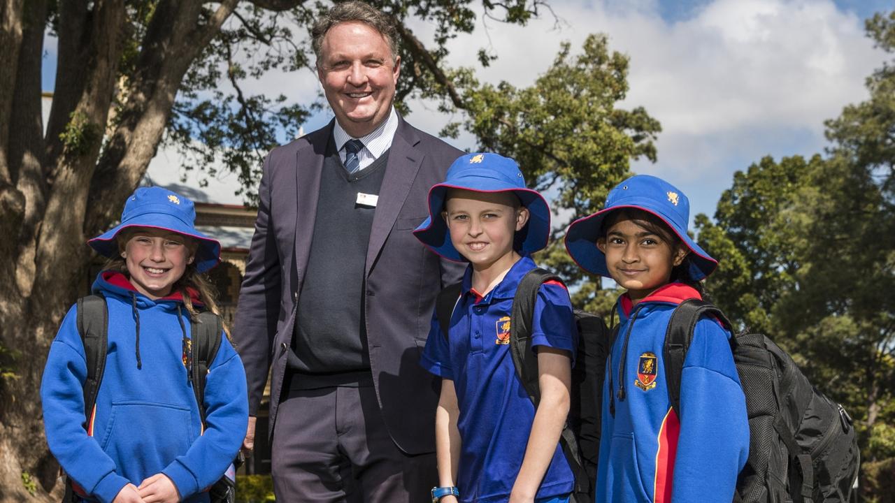 Downlands College principal Stephen Koch with students (from left) Sophie Reynolds, Jaxson Parker and Sasithmi Kevitiyagala as the college announces it will take Prep students from 2023. Picture: Kevin Farmer