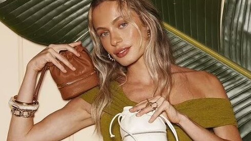 Major Australian fashion company has gone into voluntary administration, but hopes to keep all of its shops open and not lose any of its 400 employees. One of its brands is Colette by Colette Hayman (model pictured)