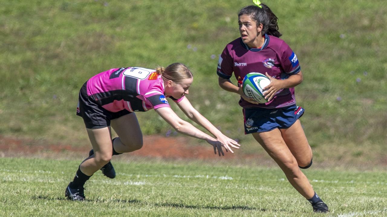 Lily Black (right) rounds her opponent.