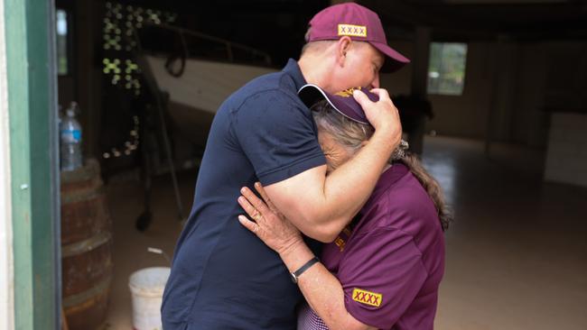 Labor Leader Steven Miles comforting a distraught Juliene Collins whose Ingham home was badly damaged by flooding. Picture: Supplied