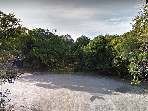 The unsealed car park at the end of Cheese Tree Drive, within Crowdy Head National Park. Picture: Google