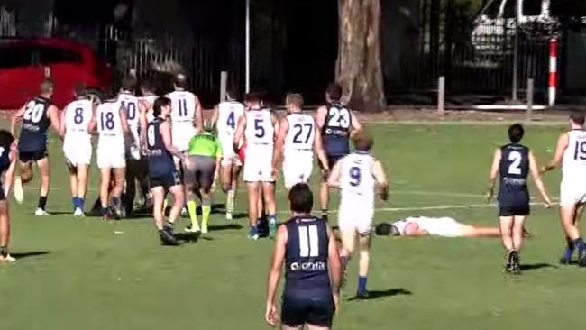 A skirmish breaks out between Glenunga and SPOC as Will Montgomery lays motionless. Picture: Dartfish TV