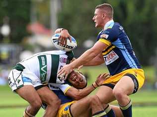 TURNING FORTUNES: Ipswich Jets halfback Julian Christian gets taken down by the North tacklers in today's 31-14 Intrust Super Cup loss at the North Ipswich Reserve. The result is subject to a QRL review on Monday. Picture: Rob Williams