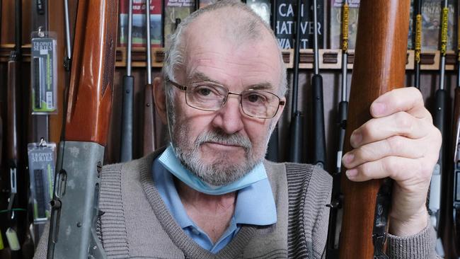 The National Gun Amnesty is now running, with the public asked to hand in unregistered guns to licensed firearms dealers, such as The Outdoor Sportsman in Geelong West. Manager Rod Haugh holds two semiautomatic guns handed in during amnesty. Picture: Mark Wilson