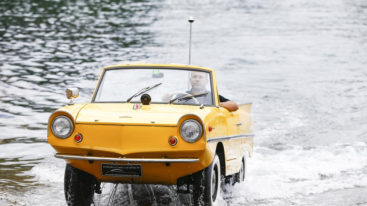 Jason Fischer driving the 1966 Amphicar 770. Picture: Dylan Robinson