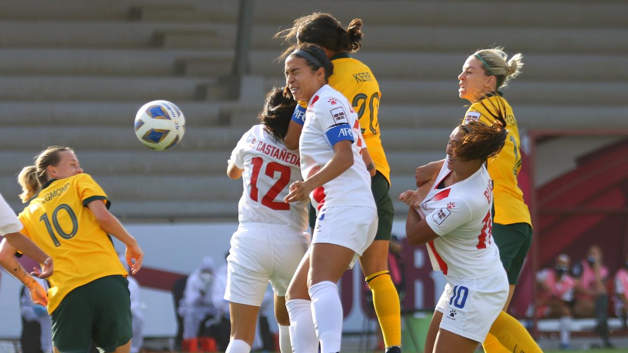 Sam Kerr (3rd R) of Australia heads to score her side's first goal against the Philippines (Photo by Thananuwat Srirasant/Getty Images)