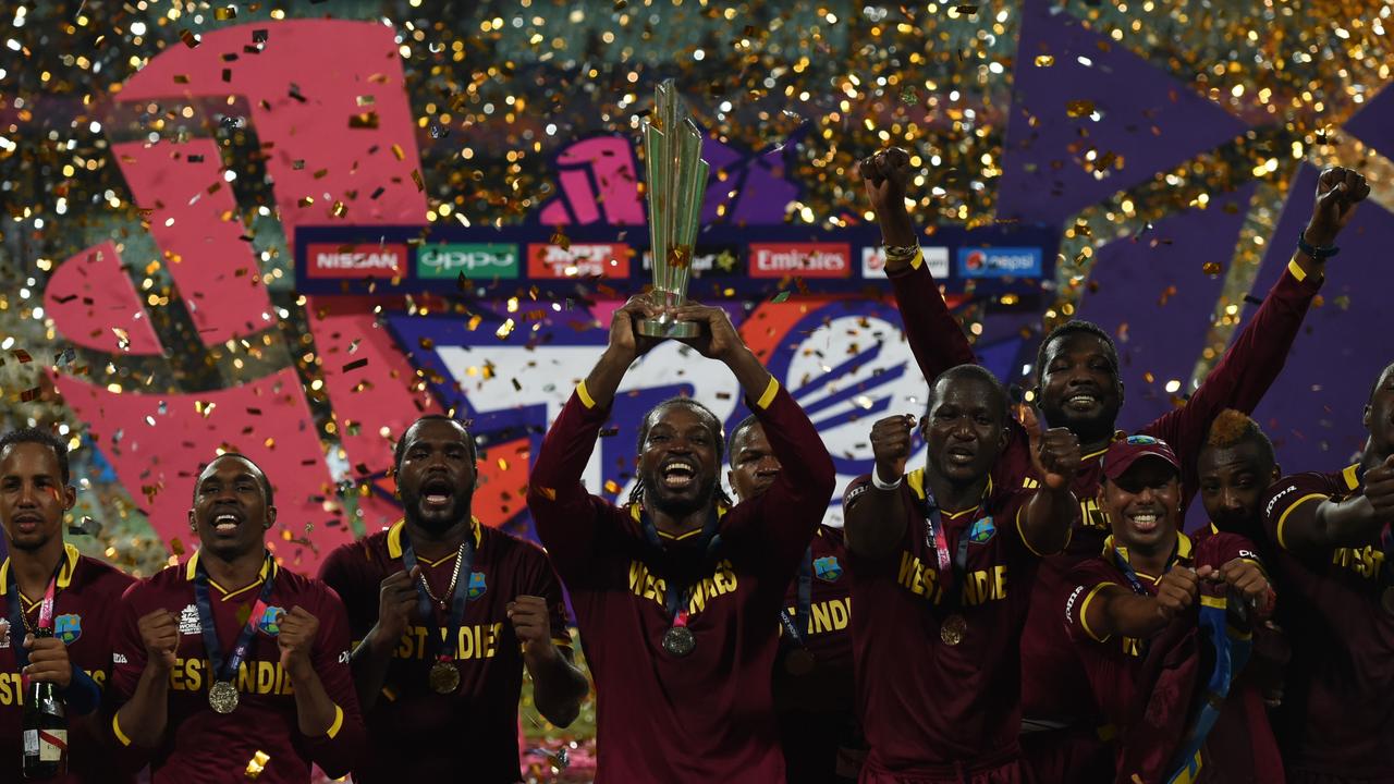 The West Indies celebrate their 2016 T20 World Cup victory. (Photo by Indranil MUKHERJEE / AFP)