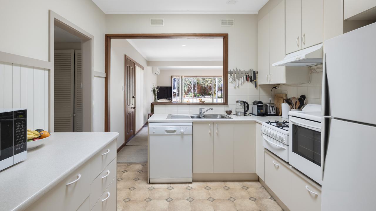 The kitchen adjacent to the family room.