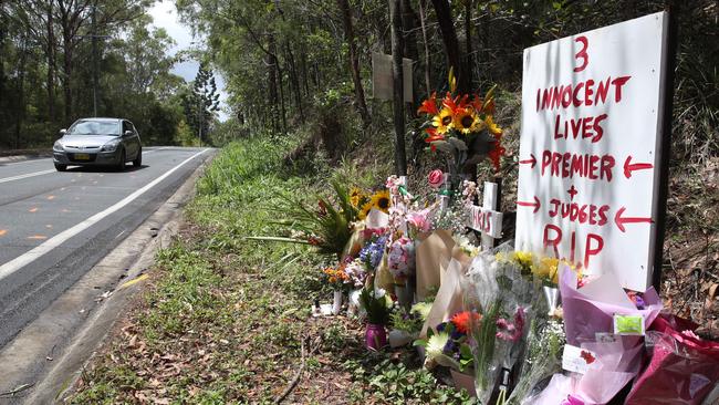 Tributes and flowers at the scene of a Bonogin triple fatal. Picture: Glenn Hampson.