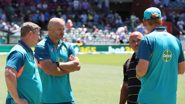 Crows coaches Scott Burns and Matthew Nicks with Australian cricket mentor Andrew McDonald and Adelaide Oval head curator Damian Hough. Picture: Paul Kane/Getty Images