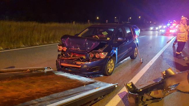 Another car is towed away from the incident at Moonee Beach.