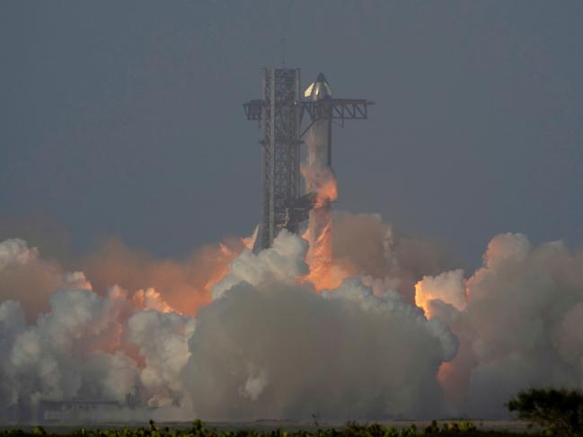 SpaceX's mega rocket Starship makes a test flight from Starbase, Texas, Tuesday, May 27, 2025. (AP Photo/Eric Gay)