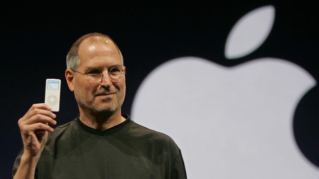 Apple Computers Inc. CEO Steve Jobs holds up the new iPod Nano in San Francisco, Sept. 07, 2005. The Apple iPod Nano is 1/5 the size of the original iPod and weighs 42 grams. (AP PicPaul/Sakuma) mobile phone phones technology