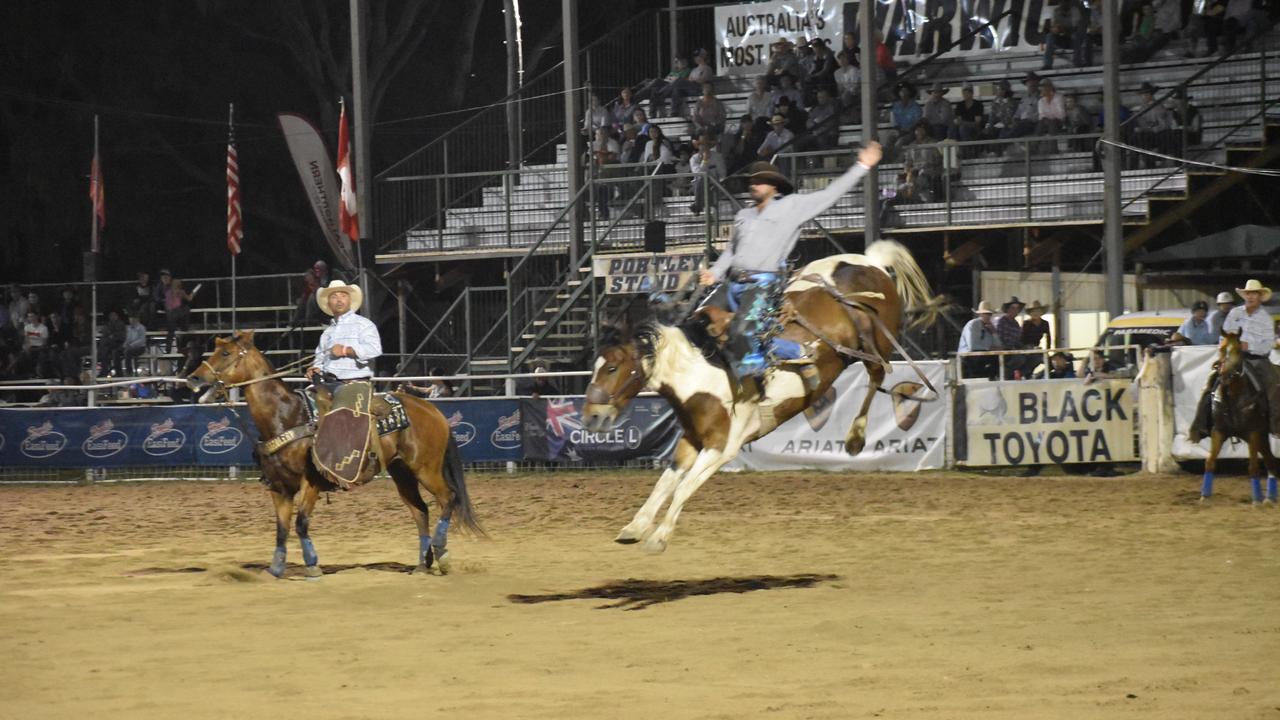 Michael Neylon competing in the opening round of the open saddle bronc at the 2021 Warwick Rodeo.