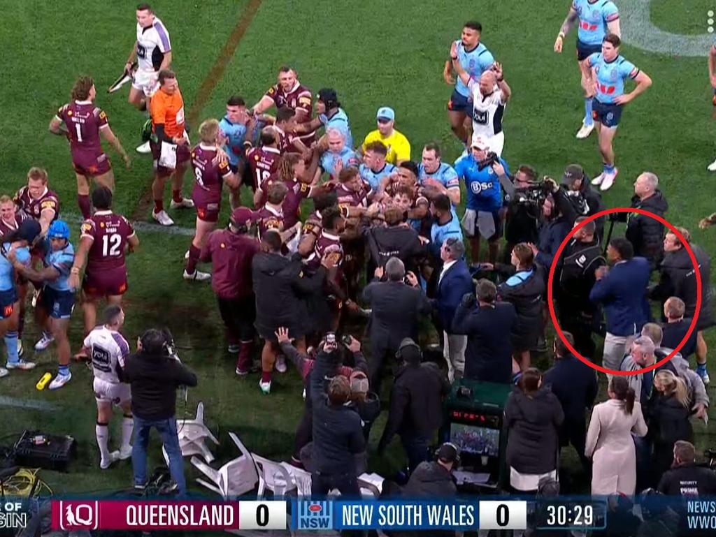 Haumole Olakau’atu joins the Origin scuffle from the sidelines. Picture: Channel 9