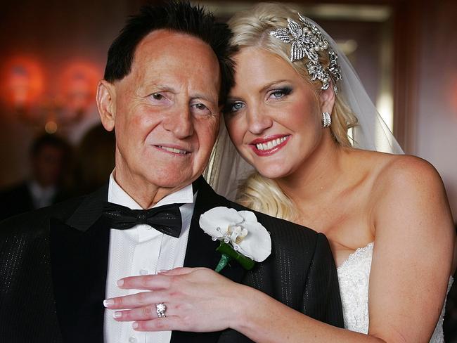 Bride Brynne Gordon and groom Geoffrey Edelsten pose for a photograph after their 2009 wedding. Picture: Getty