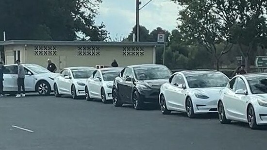 A screenshot of a clip showing a long queue of Teslas waiting for a charging station spot in Keith in rural South Australia. Picture: @pauylyohh83