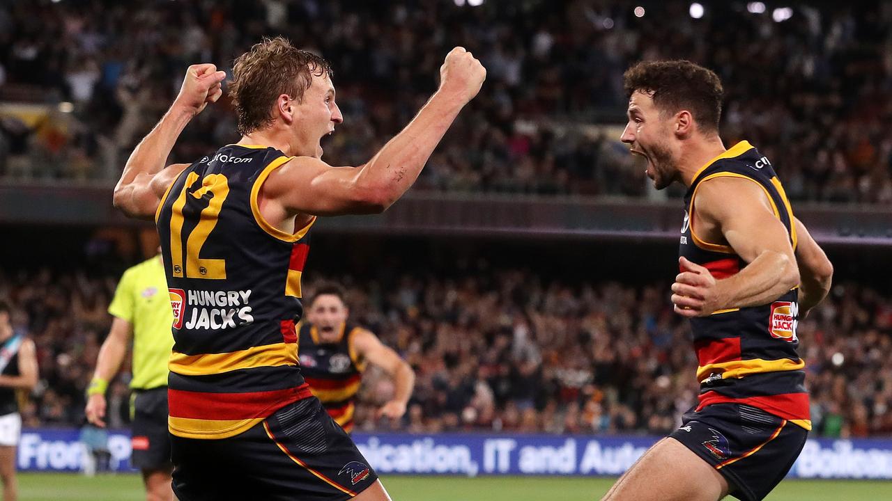 Jordan Dawson celebrates after kicking the Showdown matchwinner. Picture: Sarah Reed/AFL Photos via Getty Images