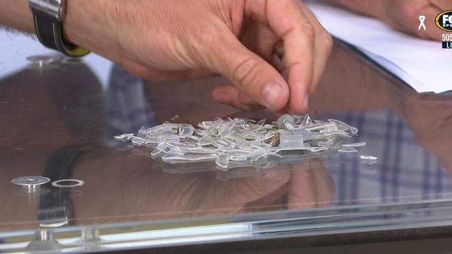 Plastic shards and a screw found on the pitch. Picture: Fox Sports
