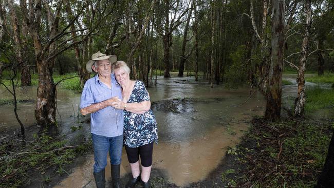 Keith Connors and Veronica Russo-Connors have a storm water drain from a nearby housing development flooding their backyard. AAP/Renae Droop