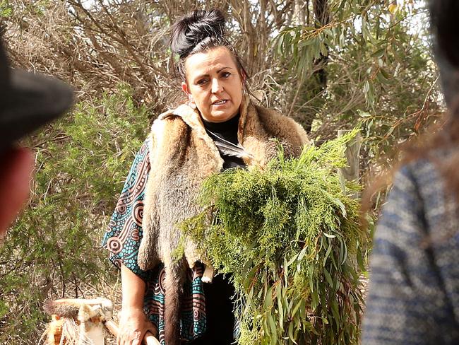 Corrina Eccles performs a smoking ceremony on behalf of the Wadawurrung People to take back  ownership of land from Boral . Picture: Alison Wynd