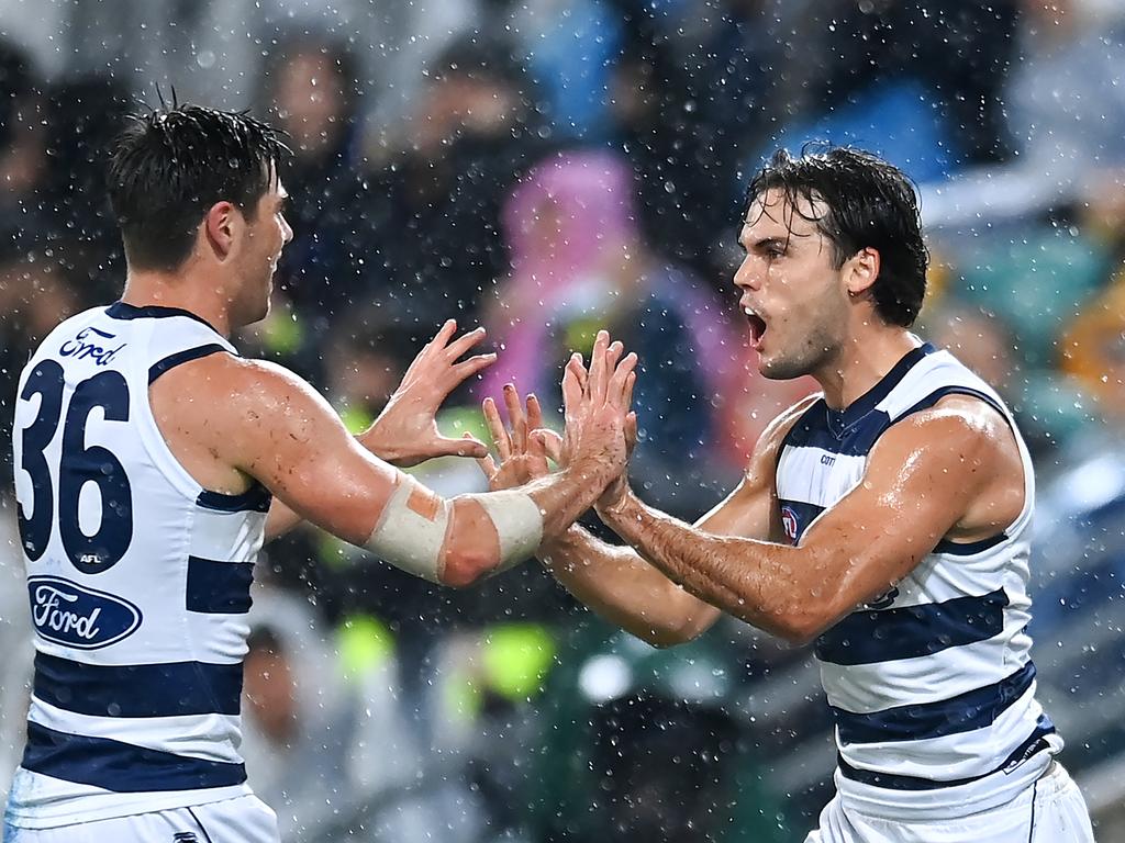 BRISBANE, AUSTRALIA - APRIL 20: Jack Bowes of the Cats celebrates kicking a goal during the round nine AFL match between Brisbane Lions and Geelong Cats at The Gabba, on April 20, 2024, in Brisbane, Australia. (Photo by Albert Perez/AFL Photos via Getty Images)