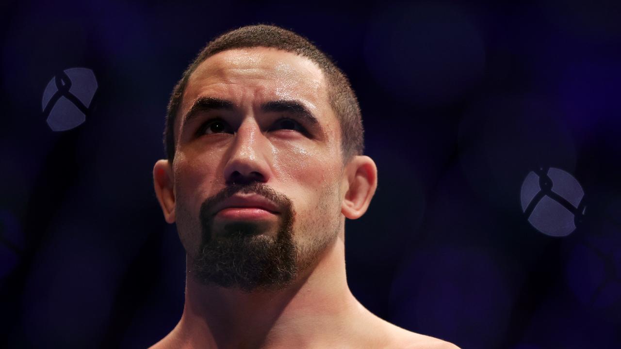 HOUSTON, TEXAS - FEBRUARY 12: Robert Whittaker of Australia looks on before his middleweight championship fight against Israel Adesanya of Nigeria during UFC 271 at Toyota Center on February 12, 2022 in Houston, Texas. Carmen Mandato/Getty Images/AFP == FOR NEWSPAPERS, INTERNET, TELCOS &amp; TELEVISION USE ONLY ==