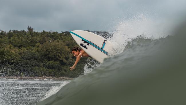 Free surfing at Hainan China, Pacha Light enjoys travelling the world surfing and competing while supporting ocean -conservation causes. Please credit photo to Remi Blanc.