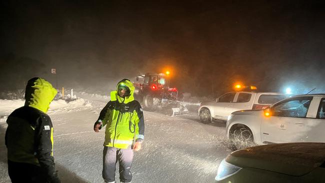 Hobart City Council workers brave think snow and blizzard conditions on their way to rescue walkers stranded on kunanyi/MtWellington. Picture: City of Hobart