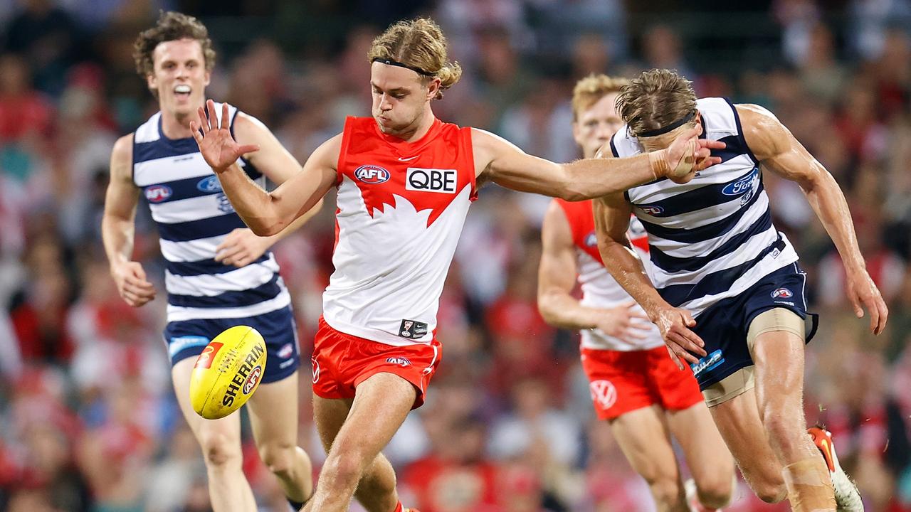 SYDNEY, AUSTRALIA - MARCH 25: James Rowbottom of the Swans kicks the ball during the 2022 AFL Round 02 match between the Sydney Swans and the Geelong Cats at the Sydney Cricket Ground on March 25, 2022 In Sydney, Australia. (Photo by Michael Willson/AFL Photos via Getty Images)