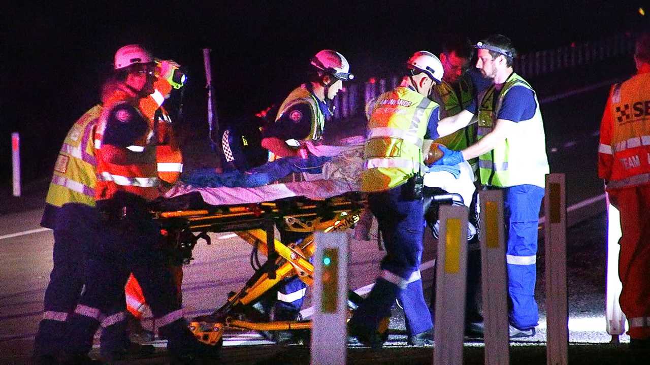 Two men were killed and one woman injured in a single-vehicle roll-over on the Pacific Highway near Glenugie on Sunday night. Picture: Frank Redward