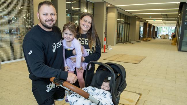 Aaron London and Riki McClure and their children Rylee, 4, and Troy, 3 months, at the new Norwood Mall shopping centre under construction in Norwood. Picture: Mark Brake