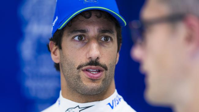 SPA, BELGIUM - JULY 25: Daniel Ricciardo of Australia and Visa Cash App RB looks on in the garage during previews ahead of the F1 Grand Prix of Belgium at Circuit de Spa-Francorchamps on July 25, 2024 in Spa, Belgium. (Photo by Rudy Carezzevoli/Getty Images)