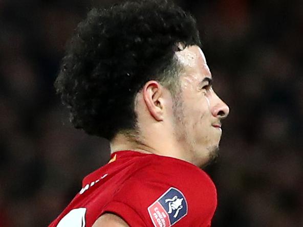 LIVERPOOL, ENGLAND - JANUARY 05: Curtis Jones of Liverpool celebrates after scoring his team's first goal during the FA Cup Third Round match between Liverpool and Everton at Anfield on January 05, 2020 in Liverpool, England. (Photo by Clive Brunskill/Getty Images)