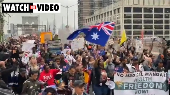 Protesters chant "save Australia" in New York anti-vaccine rally