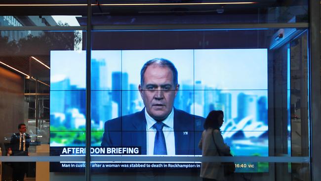 Managing Director of the ABC David Anderson on a TV screen at the Ultimo headquarters discussing job cuts. Picture: John Feder.