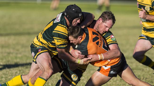 Ryan Duggan (left) and Dale Perkins of Wattles tackle Ben Howard of Southern Suburbs in TRL A grade round nine rugby league at Gold Park, Sunday, June 13, 2021. Picture: Kevin Farmer