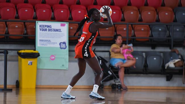 The NT’s Deedee Lambert up against NSW in the 2023 National Netball Championships. Picture: Pema Tamang Pakhrin