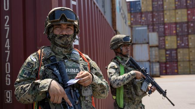 Mexico's Navy watch over containers at the port of Lazaro Cardenas that have a high risk of containing drugs. Picture: Jason Edwards