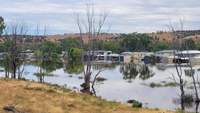 Flood waters around buildings at Bow Hill on January 16. Picture: Clayton Bay Riverside Holiday Park