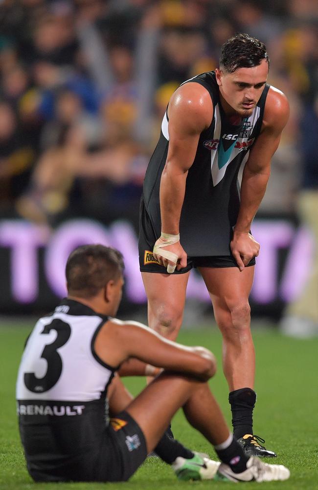 Jake Neade and Sam Powell-Pepper show the pain of Saturday night’s loss. Picture: AAP IMAGE