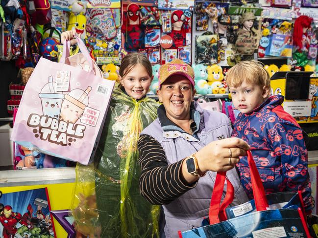 Showbag fun for Alice Mann and her kids Stella and Lewis Mann at the Toowoomba Royal Show, Saturday, April 20, 2024. Picture: Kevin Farmer