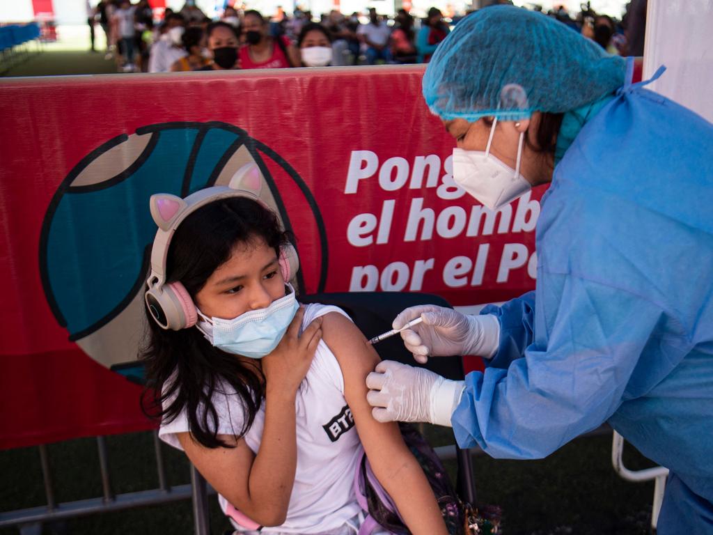 A child in Peru receives a Pfizer Covid vaccine in January 2022. Picture: Ernesto Benavides/AFP