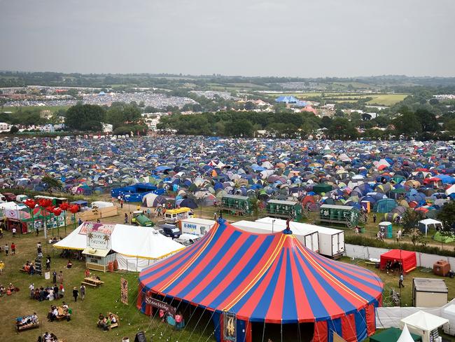 It’s best to turn up early or you’ll end up camping near the loos. Pictured, the scene in 2009. Picture: AFP/LEON NEAL.