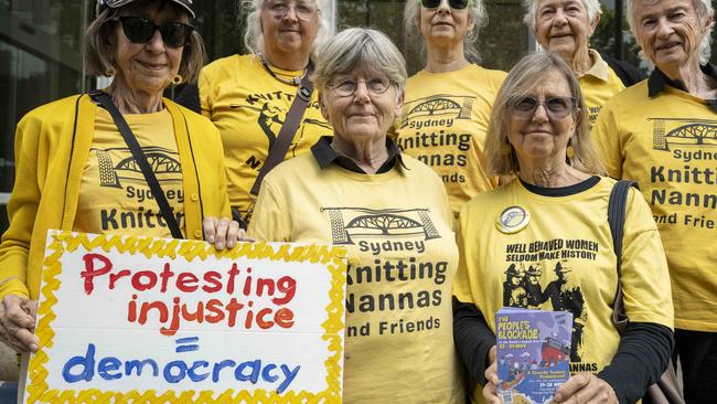 Protesters pictured outside the Supreme Court as the NSW Commissioner of Police attempts to stop a planned protest by Rising Tide at the Port of Newcastle. Picture: NewsWire / Monique Harmer