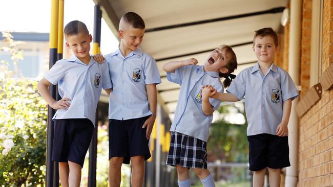 The Pajak and Nunes families were relieved to find their school’s principal supported their ability to choice their twins’ class placement. Picture: Jonathan Ng