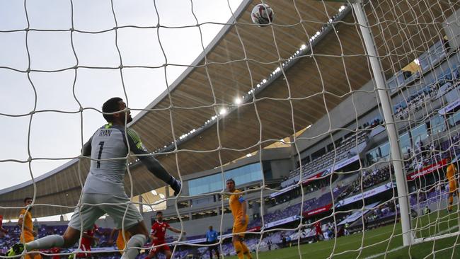 Mat Ryan can’t stop Anas Bani Yaseen’s powerful header.