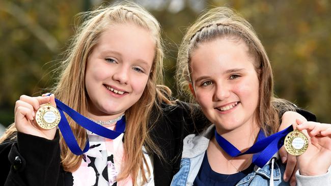 Triple-0 Hero sisters Ebony, 13, and Georgia, 11. The girls called 000 when a fire their dad started became out of control. Picture: Kylie Else