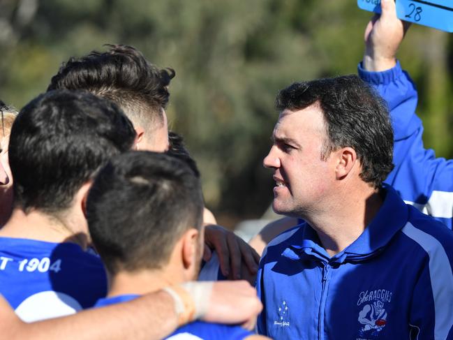 AMATEUR FOOTY: Athelstone  (blue) v Rostrevor OC (red) photographed at Paradise, Adelaide, on Saturday the 12th of May 2018.  A- Coach - Jade Sheedy(AAP/ Keryn Stevens)