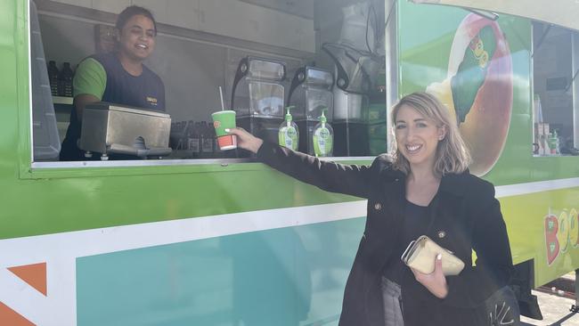 Katrina Visentin buying her favourite Mango Magic smoothie from the Stanthorpe pop-up store.